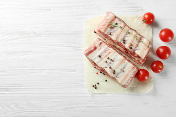 Fresh raw pork ribs on kitchen table