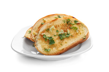 Plate with delicious homemade garlic bread isolated on white