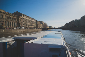 Fototapeta na wymiar Water excursions along the rivers and canals of St. Petersburg. Leshtukov bridge.