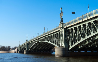 Fototapeta na wymiar Troitsky drawbridge bridge across the Neva River in St. Petersburg.