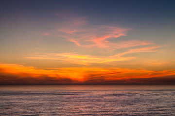 Fototapeta na wymiar Beautiful sunset over the Pacific Ocean from the coast of Oregon, USA