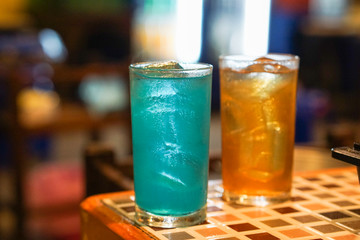 Beautiful retro lighting gold and blue cocktail.