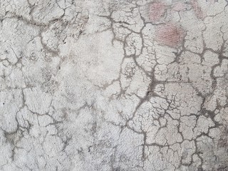 Cracked concrete texture closeup background