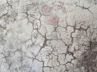 Cracked concrete texture closeup background