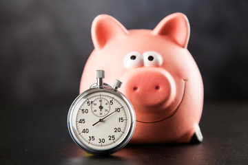 Analog stopwatch on black background