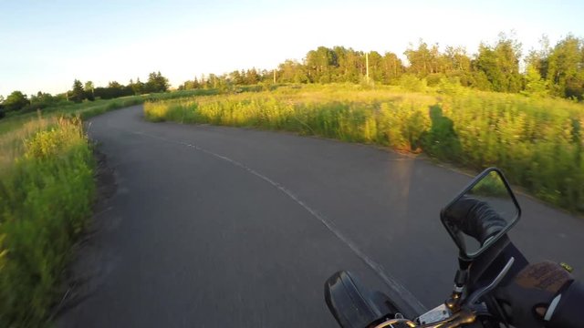 motorcycle cornering on racetrack sunset helmet gimbal gopro 4k