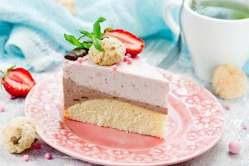 Homemade layered strawberry chocolate mousse cake