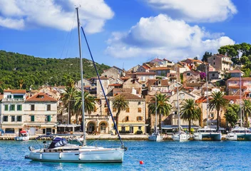 Wall murals City on the water View of the Hvar town, Hvar island, Dalmatia, Croatia. Famous landmark and touristic destination for travel in Europe