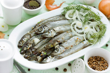 Salted fish marinated with spices and onion