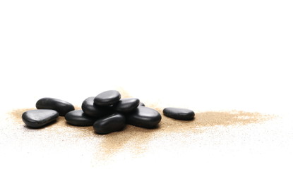 Black stone and pile sand isolated on white background