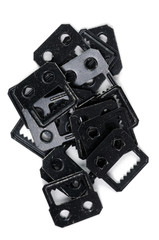 A metal mount of black color on a white background. View from above.