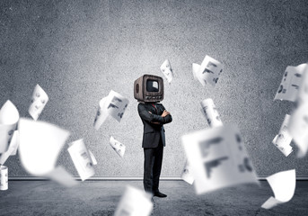 Businessman with old TV instead of head.