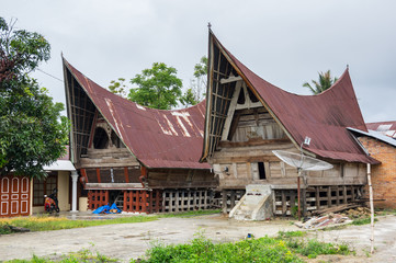 Fototapeta na wymiar View of houses of village Tuktuk on island Samosir