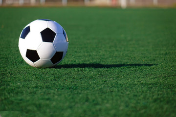 Football on a green field