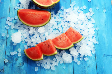 watermelon on blue background. juicy summer fruit in slices