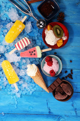 Obraz na płótnie Canvas Vanilla frozen yogurt or soft ice cream in waffle cone.