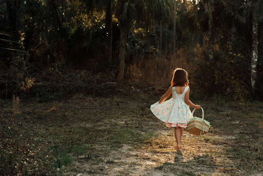 Girl walking with basket