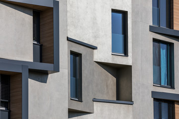 Fototapeta na wymiar Contemporary design of multifamily living houses. Modern luxury apartments buildings