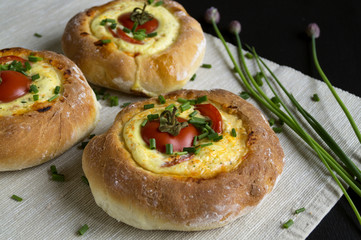 Homemade country cake with cheese and tomatoes.