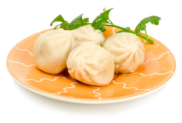 Khinkali, a georgian dumpling, on a white background