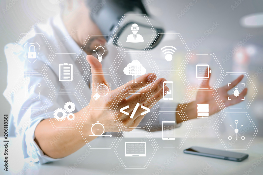 Poster businessman wearing virtual reality goggles in modern office with smartphone using with vr headset