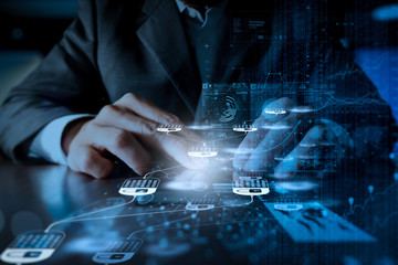 Businessman hand using mobile phone with digital layer effect as business strategy concept