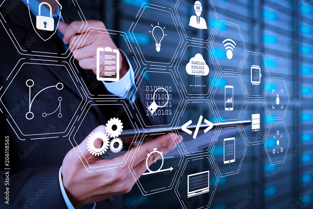 Poster businessman hand using tablet computer and server room
