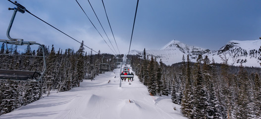 Ski lift ride at Big Sky