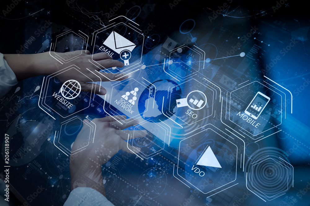 Aufkleber top view of businessman hand working with modern technology and digital layer effect as business strategy concept