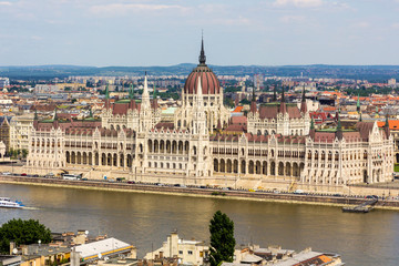Fototapeta na wymiar Hungarian Parliament at daytime. Budapest. One of the most beautiful buildings in the Hungarian capital.