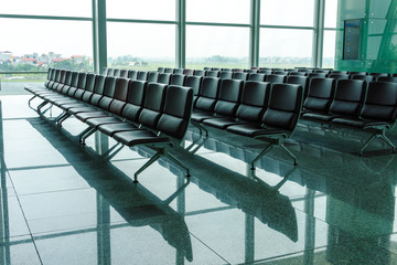 Empty bench in the terminal of airport