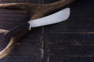 One big knife. The texture of a deer horn.