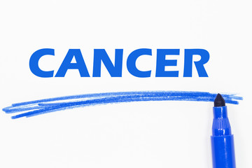 cancer word written with blue marker