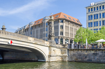 Naklejka premium Spreeufer with the building of the theological faculty, Spreepalais and Friedrichs Bridge in Berlin