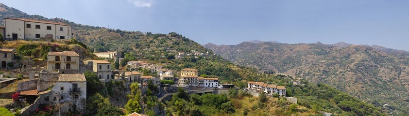 Fototapeta na wymiar The panorama view of buildings in old mountain village Savoca in Sicily, Italy