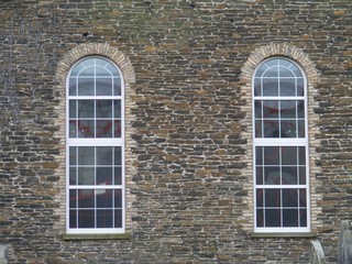 old window on brick wall