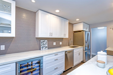 White small kitchen in modern apartment.