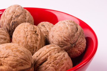 walnuts in red plate