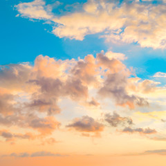 Naklejka na ściany i meble sunset sky with lighted clouds