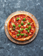 Pizza margherita on the chalk board with copy space