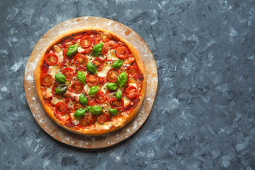 Pizza margherita on the chalk board with copy space