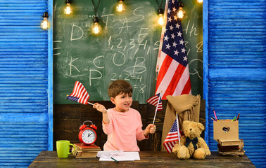 Group four happy people having waving American flag. Little help can get student back on track....
