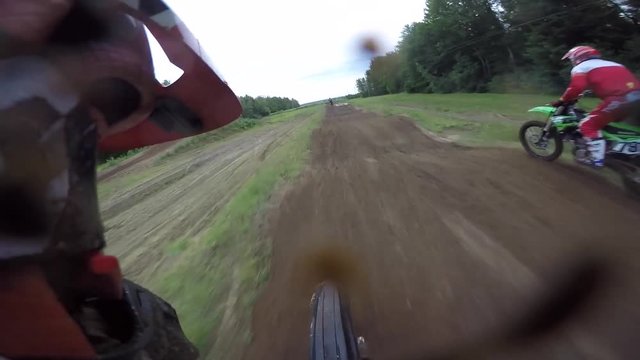 motocross passing rider in whoop section dirty muddy gopro