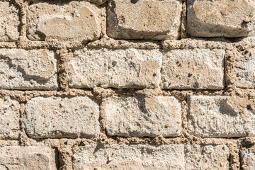 texture of the old wall of brick blocks, scattered brick and brickwork, architecture abstract background