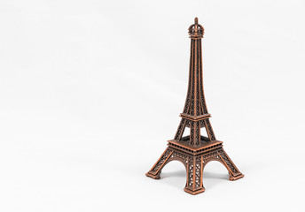 Bronze Eiffel Tower model, isolated on white background