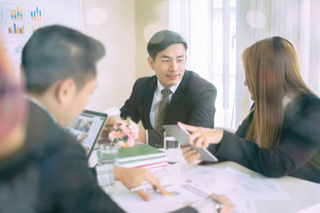 Teamwork concept,man and woman operate in the office with collaborative cooperation or participation,Project managers meet a business crew working with new startup. Analyze business plans