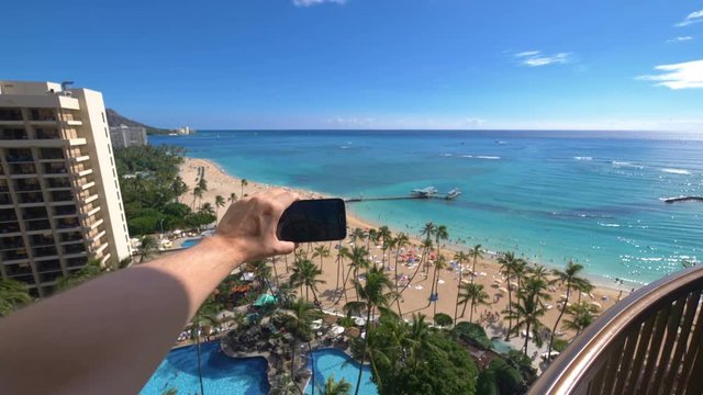 POV on the taking a selfie photo in Waikiki Beach Hawaii in 4K Slow motion 60fps