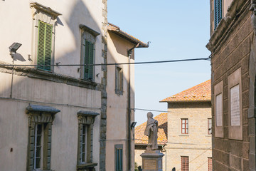 Fototapeta na wymiar urban scene with historical architecture and monument of Tuscany, Italy