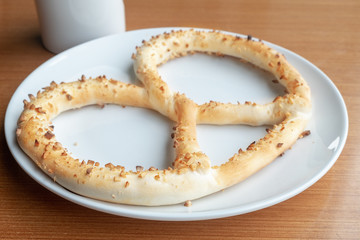 pretzel on white plate