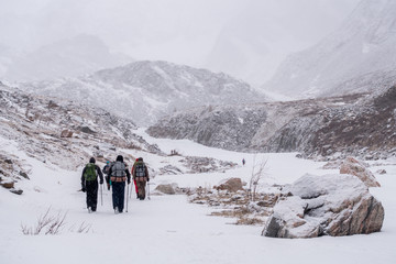 Group of tourists going to climb the mountain